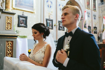 Bride and groom in the church 