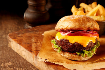 Delicious beef burger with cheese und buns.