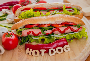 Large hot dog with vegetables
