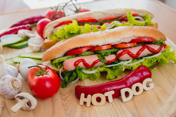 Large hot dog with vegetables