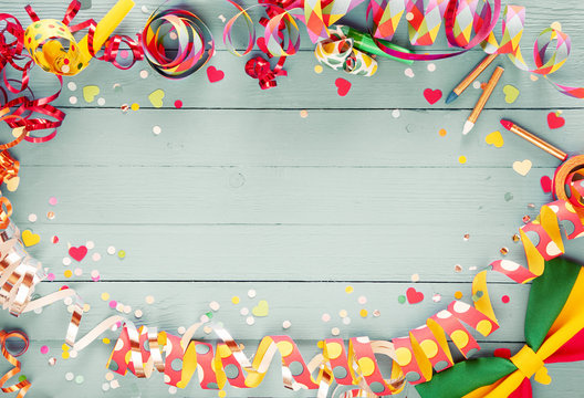 Colorful party frame with streamers and confetti