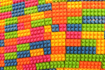 Colorful Plastic Toy Building Brick Block Pattern for Puzzle used as Background Texture