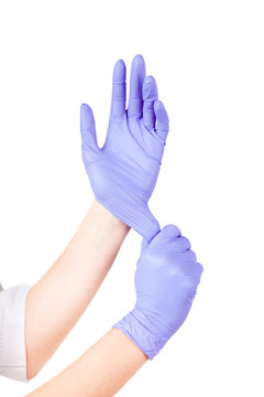 Woman doctor hands in medical gloves isolated