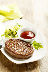 Beef burger with tomato sauce