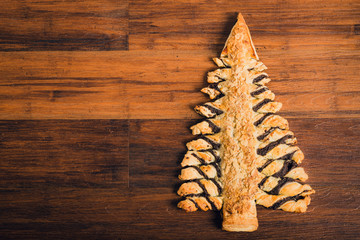 Christmas tree cake on wooden table