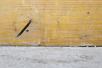 Empty concrete floor edge with wood wall