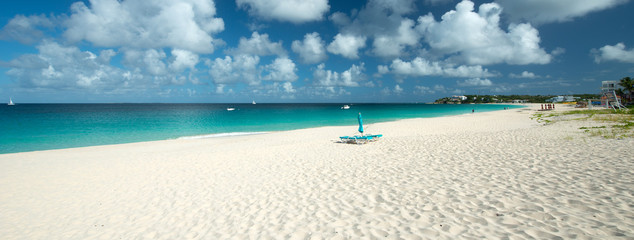 Fototapeta na wymiar Umbrellas at Meads bay, Anguilla Island