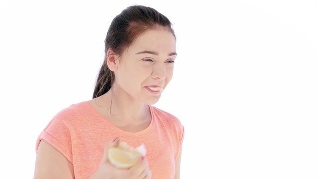 Girl Tries a Slice of Lemon