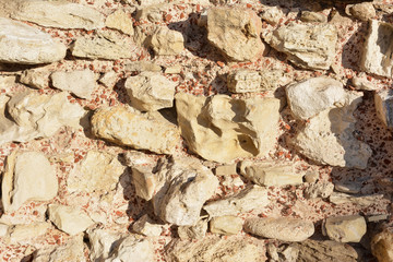 Calcareous stones and red bricks pattern