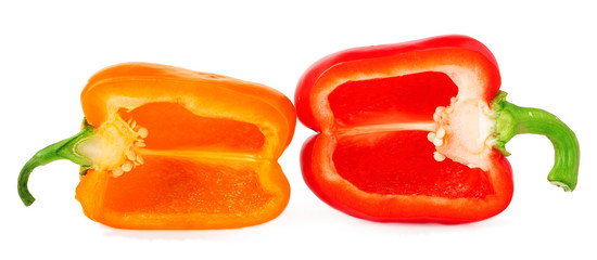 Half of red and orange bell peppers on white background