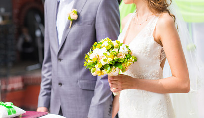 nice wedding bouquet in bride's hand