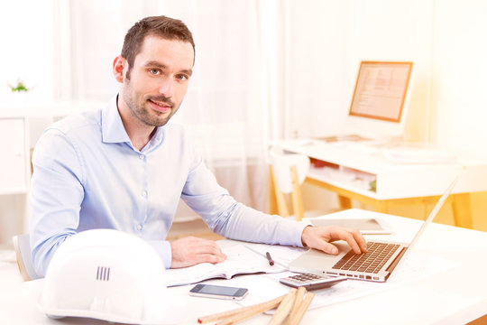 Young Attractive Architect Working Late At Office