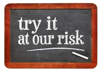 Obraz premium try at out risk marketing slogan