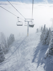 Fototapeta na wymiar Ski Resort Terrain on Sunny Winter Day