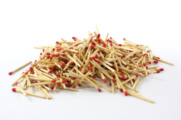 pile of matches on white background