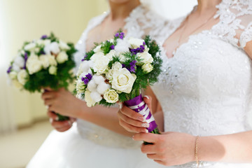 Hand of the groom and the bride at a wedding party