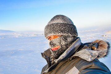 Portrait of a man in a cap and a ski mask © nordroden
