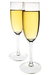Two champagne flutes on white background. Clipping path incl.