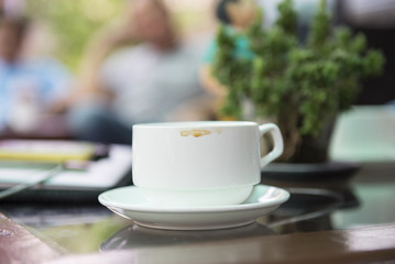 Coffee stain on the edge of the cup.