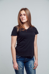 Obraz premium girl in the black shirt isolated over white background