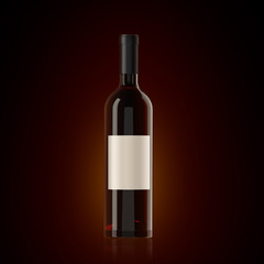 Bottle of red wine with a label on a dark background