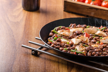 Beans with tomatoes and chicken