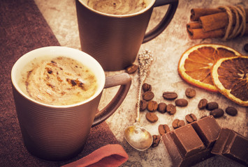 Cups of coffee on wooden