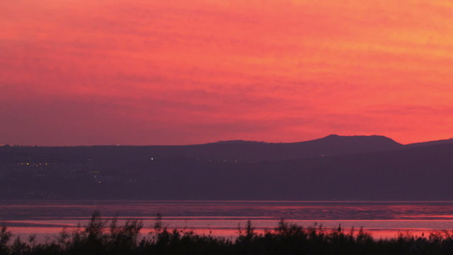 Royalty Free Stock Video Footage panorama of a Sea of Galilee sunset shot in Israel at 4k with Red.