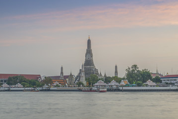 Fototapeta na wymiar Wat Arun Temple after finished construction in twilight time at