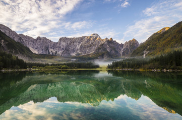 Fototapeta na wymiar panorama of mountain lake in the Alps