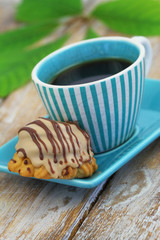 Cup of coffee and chocolate and toffee cookie
