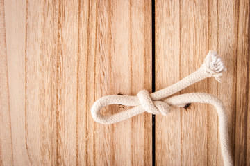 Wooden doors are closed by a cord