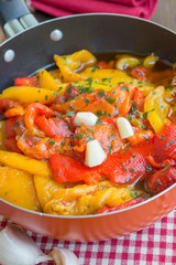 Peppers fried in a pan