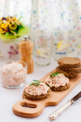 Obraz na płótnie Canvas Smoked Salmon, Cream Cheese, Dill and Horseradish Pate on Rye Br