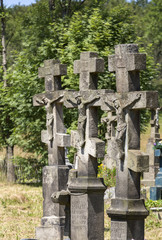 Old, abandoned stony Orthodox crosses