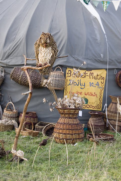 CHEPSTOW, WALES - July 2014: willow weaving and basket making stall on 31 July at the Green Gathering festival site