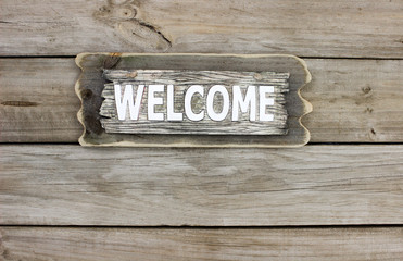 Rustic wood welcome sign