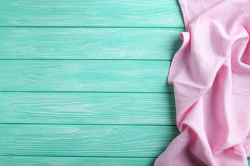 Napkin on mint wooden table, close up