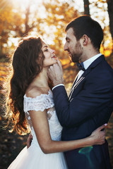 Fairytale romantic valentyne newlywed couple hugging and posing