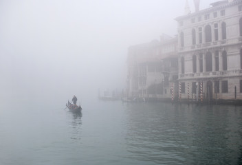 Lonely gondola in a fog, Venice