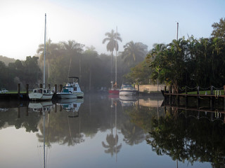 Fototapeta na wymiar Dawn on a foggy South Florida morning on Fort Lauderdale's New River