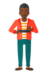 Obraz premium Man using tablet computer.