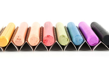 chalks in a variety of colors arranged