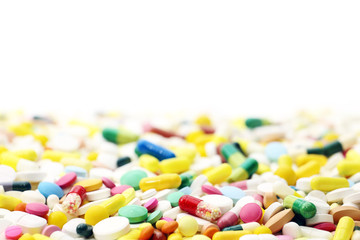 Colored pills on a white background