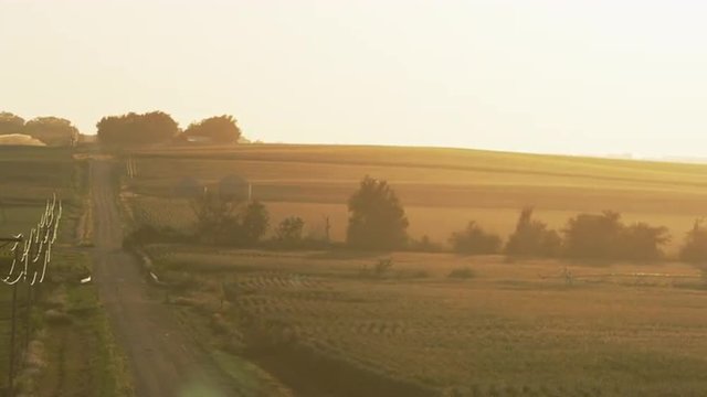 Panning view of the valley farms.