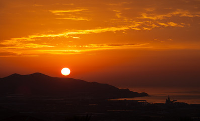 Sunrise over coast and mountain Granada