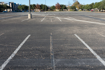 empty large car parking lot © wisanuboonrawd