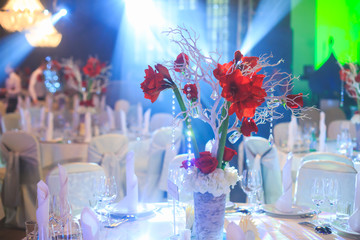 Beautiful wedding or birthday ceremony interior and table decor, flower decoration with flowers bouquet, with roses, tulips, peonies, arch