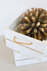 Cream and white wooden crate with driftwood feature