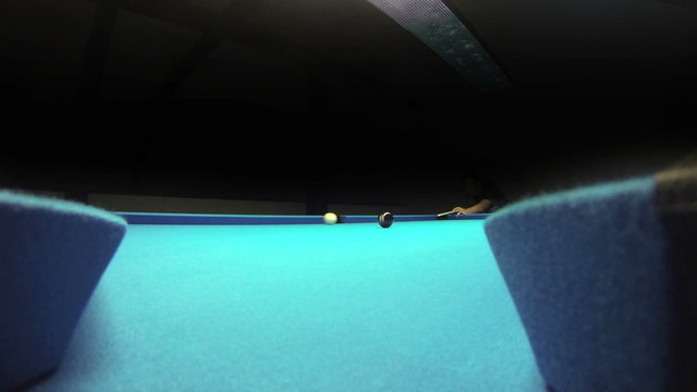 Pool billiards game - pocketing the eight view from inside the pocket